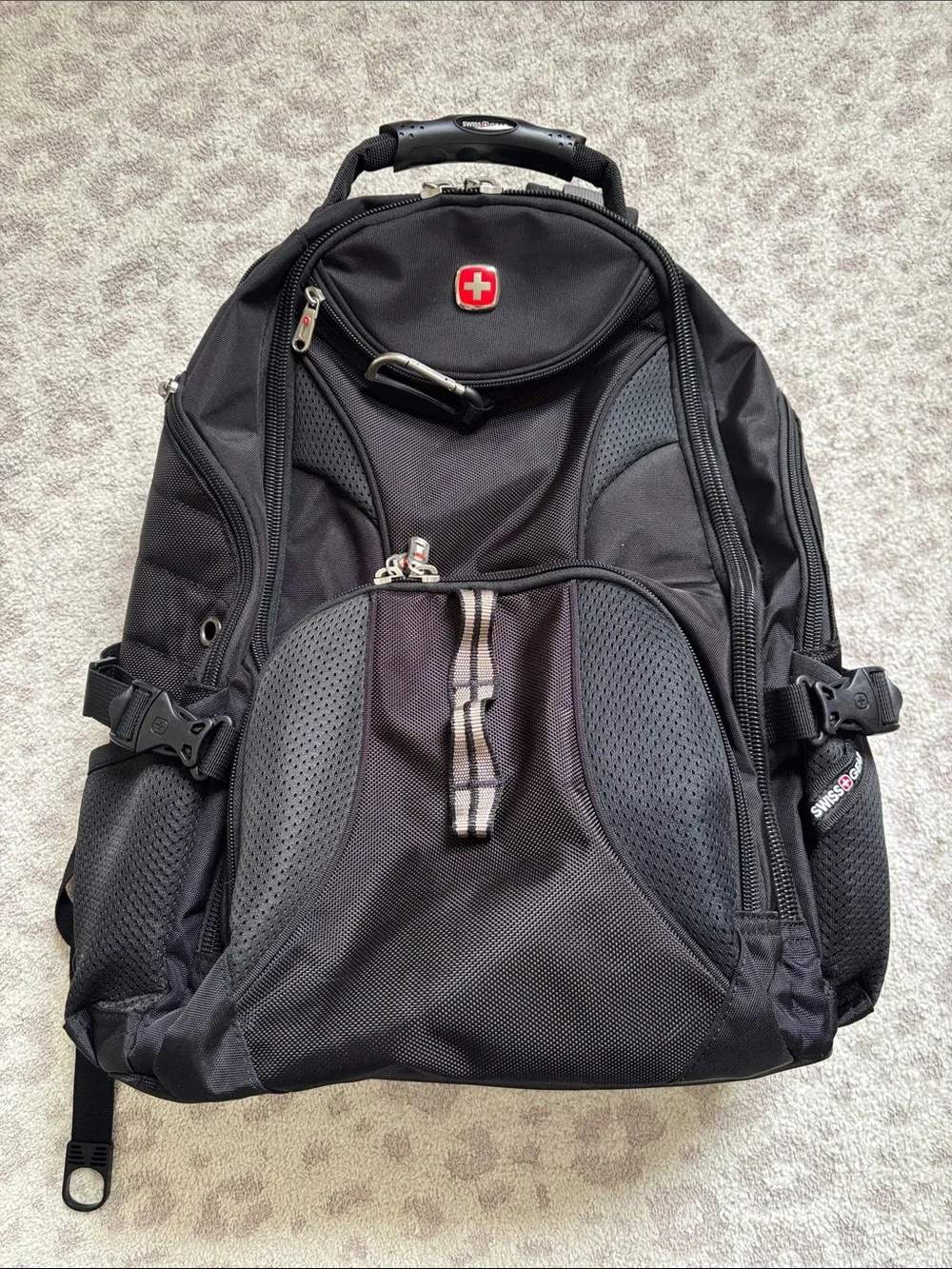 SwissGear Black Travel Backpack with Red Logo Accent